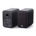 Pair of black speakers, Q Acoustics M20 Powered Wireless Music System